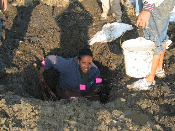 Berhe sampling a muddy pit in the Marin Headlands, near Golden Gate Bridge Marin County, CA